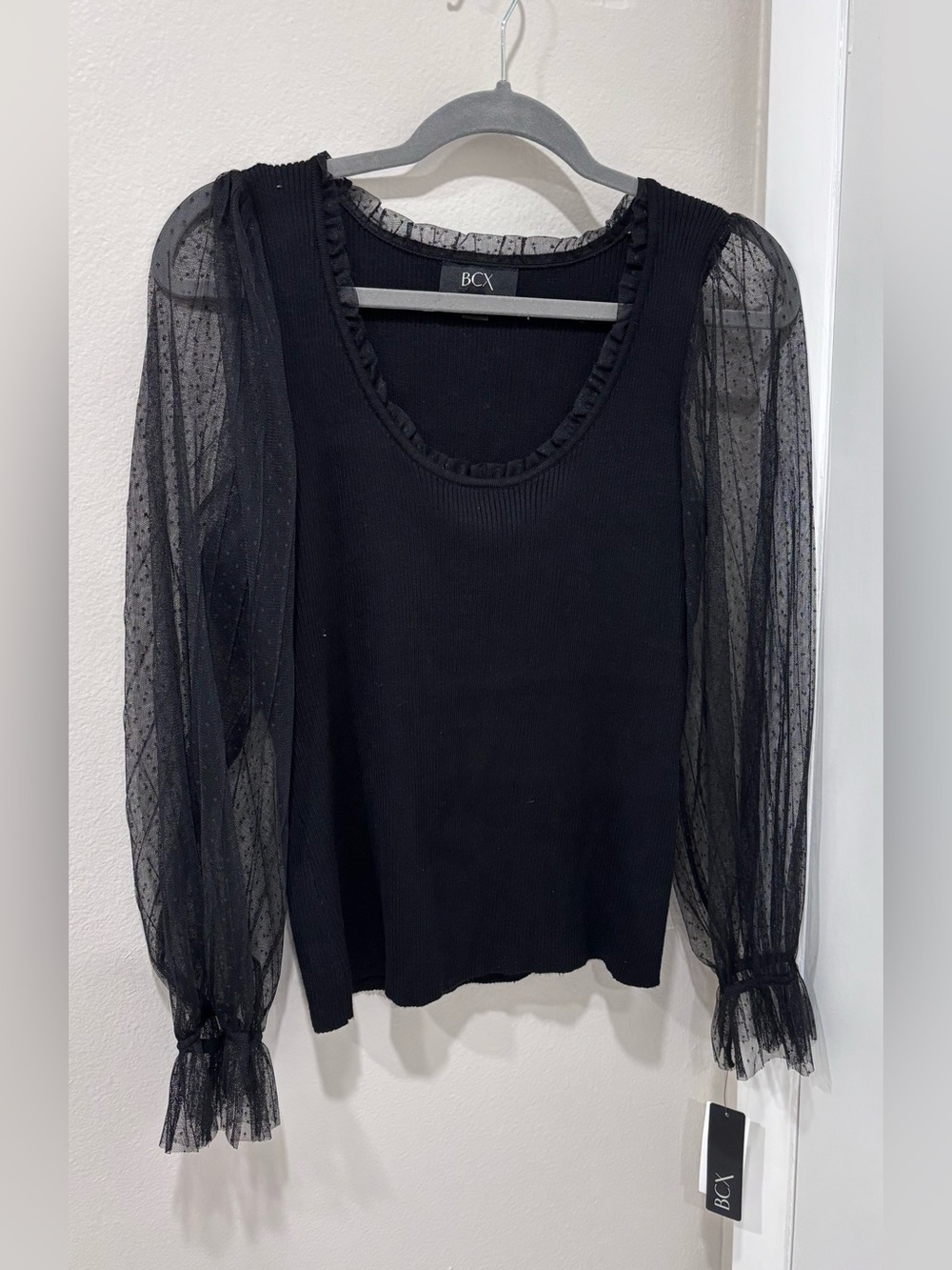 BCX Black Ribbed Knit Top with Sheer Dotted Puff Sleeves